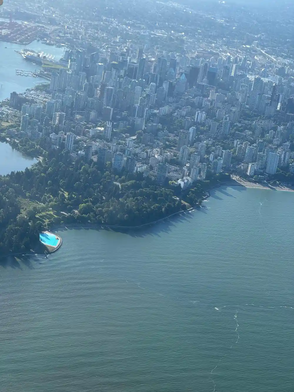 Downtown Vancouver from the air with the park and the water below