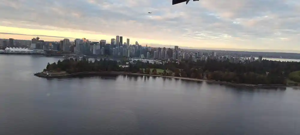The Vancouver skyline and Stanley Park from the air at dusk
